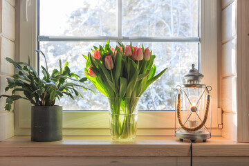 8 March Women's Day greeting card, spring bouquet of tulips flowers on the windowsill