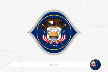 Utah flag for basketball competition on gray basketball background.