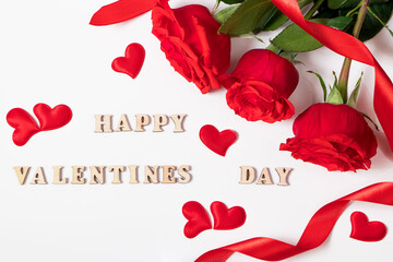 Valentine's day lettering. Red roses and hearts on a white background.