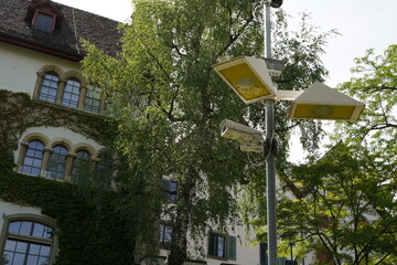 Watching or surveillance system with CCTV cameras  and reflectors used for as measures to guarantee security outdoors. 