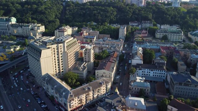 Aerial view of Podil district, Kyiv Ukraine. Historical district skyline from above. Panoramic cityscape, sunny day
