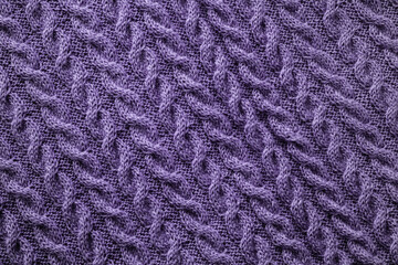 Knitted texture with braids in very peri color 2022.