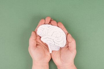 Holding a brain in the hands, Parkinson disease, Alzheimer awardness, mental disorder dementia,...