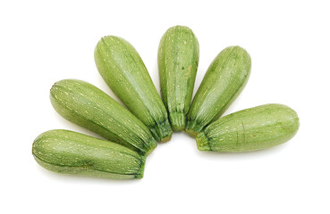 Three fresh green zucchini isolated on white background 