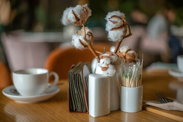 Auxiliary devices on the table in the cafe