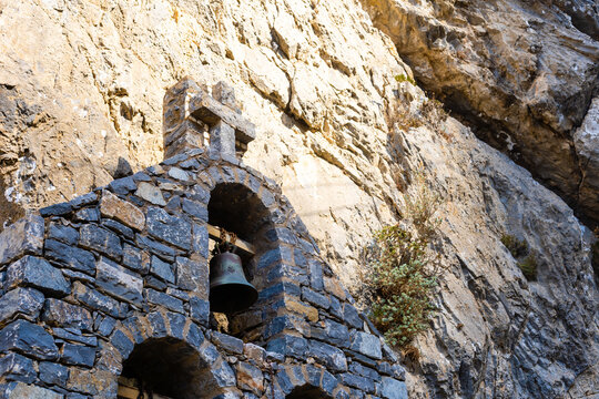 Picturesque belfry of the old orthodox church of Saint Nicholas the Wonderworker, built in the rock.Crete island. Greece.Europe.