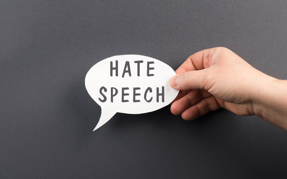 The words hate speech are standing on a speech bubble, political correctness, racism, defamation
