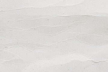 A sheet of white recycled wrinkled cardboard, white clean poster paper texture