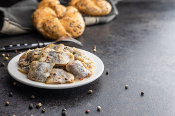 Chopped marinated fish. Salted herring