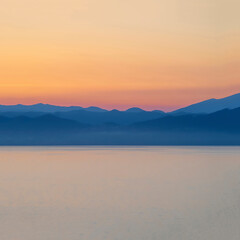 The Mediterranean coast of Italy at dawn as a colourful background abstract