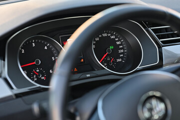 the dashboard of the car is black