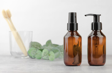 Cosmetic bottles with pump and spray. Natural organic cosmetics for personal hygiene. SPA cosmetics branding mockup