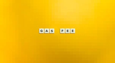 Gas Fee Phrase on Letter Tiles on Yellow Background.
