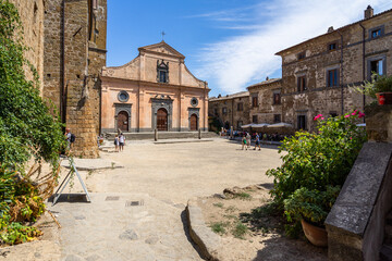 Main square in Civita  di Bagnoregio with the Romanesque Church of San Donato, Lazio, Italy