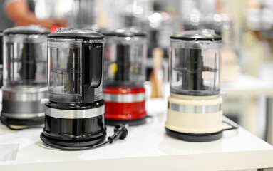 Electric food processors in an electronics store.