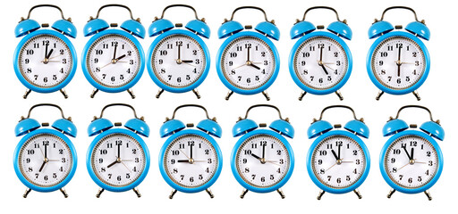 Image of a mix of alarm clocks on a white background 