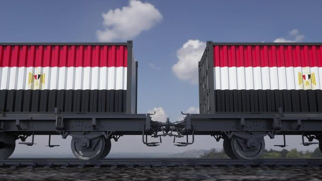 Containers with the flag of Egypt. Railway transportation