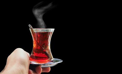 turkish tea with isolated black background
