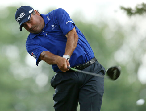 Argentina's Angel Cabrera tees off on the fifth hole during the first round of the 2013 U.S. Open golf championship at the Merion Golf Club in Ardmore