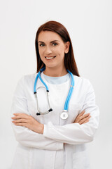 Fototapeta premium Doctor occupation. Experienced female general practitioner wearing a medical uniform, portrait