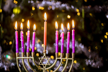 Jewish Religion holiday symbol for Hanukkah in hanukkiah Menorah with burned out candles