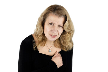 Middle-aged woman with emotions of suffering on a white background, a woman has chest pain,...