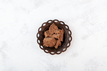 Chocolate flavor halva. Turkish sweets. Top view, copy space