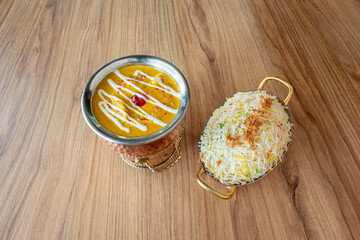 Kurma is a mild-flavored curry originating in India and Turkey, often made with yogurt sauce, heavy cream, or nuts. Korma is usually made with coconut milk.