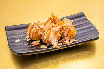 Takoyaki is a Japanese food made from wheat flour and octopus. It is made in the form of a ball....