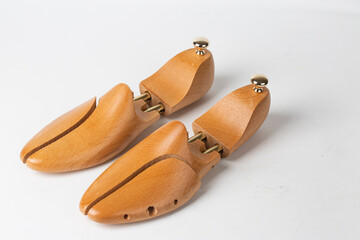 Wooden shoe mold isolated on white background