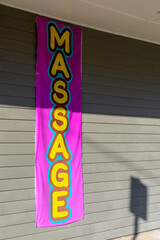 Massage banner on side of building