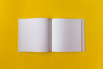 Notepad for notes with empty space for text. Yellow background.High quality photo