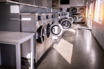 Indoors image of a coin laundry room
