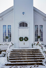 Entrance to the Snow covered historic Oakville Presbyterian Church in Oakville Oregon