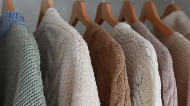 4k 60fps closeup video of clothes in a hanging locker