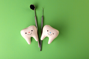 the medicine. dentistry.figures of teeth and dentist tools on the background