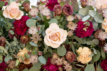 A lot of autumn-colored flowers are gathered