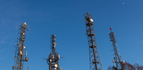 Pylons with telecommunication repeaters