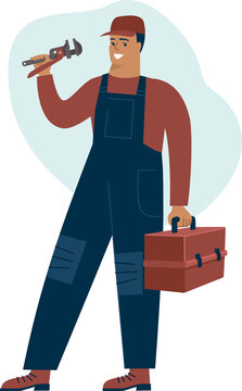 A plumber holding a wrench. Repair service and construction concept. Young Repairman