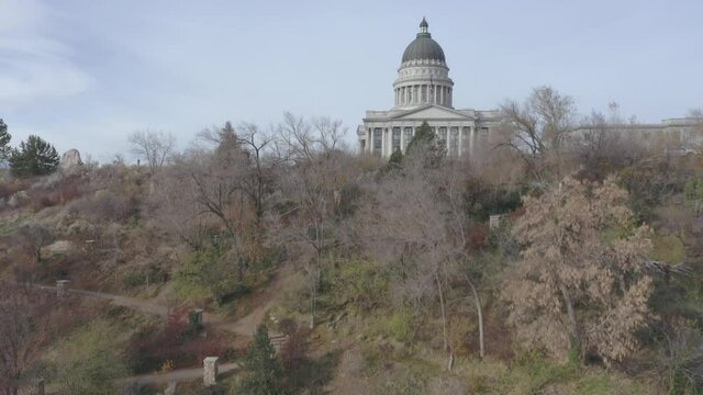 Rising aerial drone shot of Utah capitol building in Salt Lake City, UT