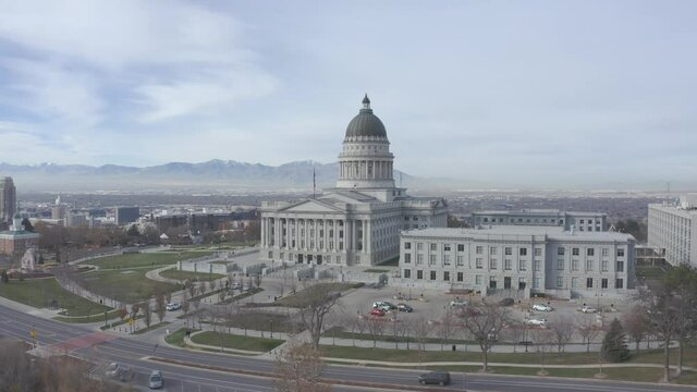 Aerial pull back drone shot of Utah capitol building in Salt Lake City, UT