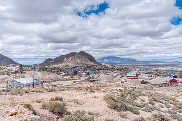 Tonopah, Nevada, US - May 19, 2011: Long view from the hills upon downtown set in brown-beige...