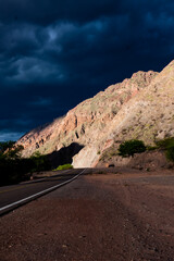 a stormy day in a route between mountains