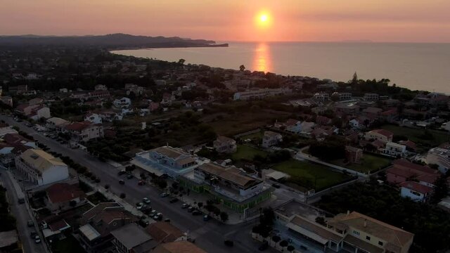 Aerial view of acharavi vilage in summer with sunset