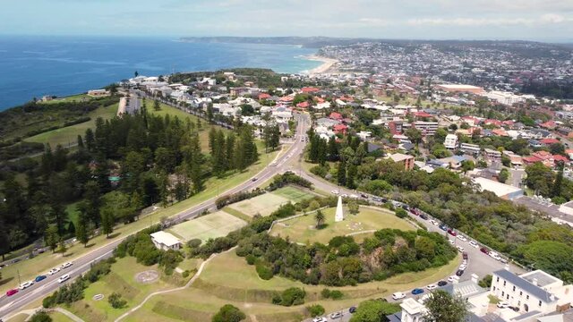 Aerial Drone view of Bar Beach Merewether rural houses roads Cooks Hill Park Newcastle tourism Pacific Ocean NSW Australia 4K