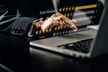 Close up of woman customer review a five-star rating on a laptop. service rating, satisfaction, feedback positive rating, customer service experience, testimonial, and satisfaction survey concept.
