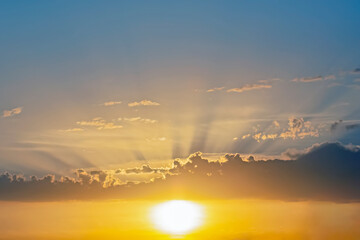 the expressive contrast of the clouds in the sky and sun. The nature and beauty of clouds