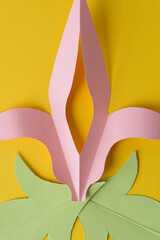 paper shape (fleur-de-lis) or a stylized lily