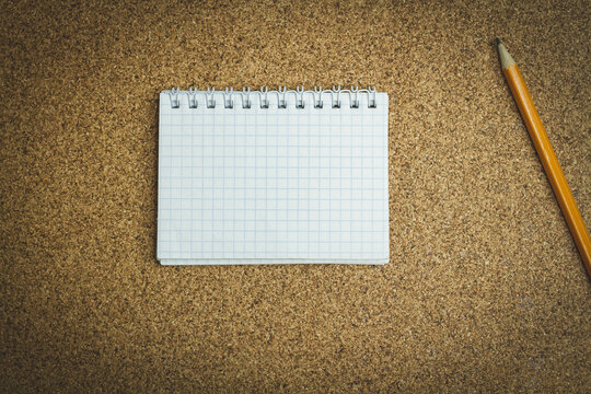 Notepad and pencil. Notes in a notebook. Template for records. Reminder note