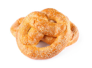 Tasty freshly baked pretzels on white background
